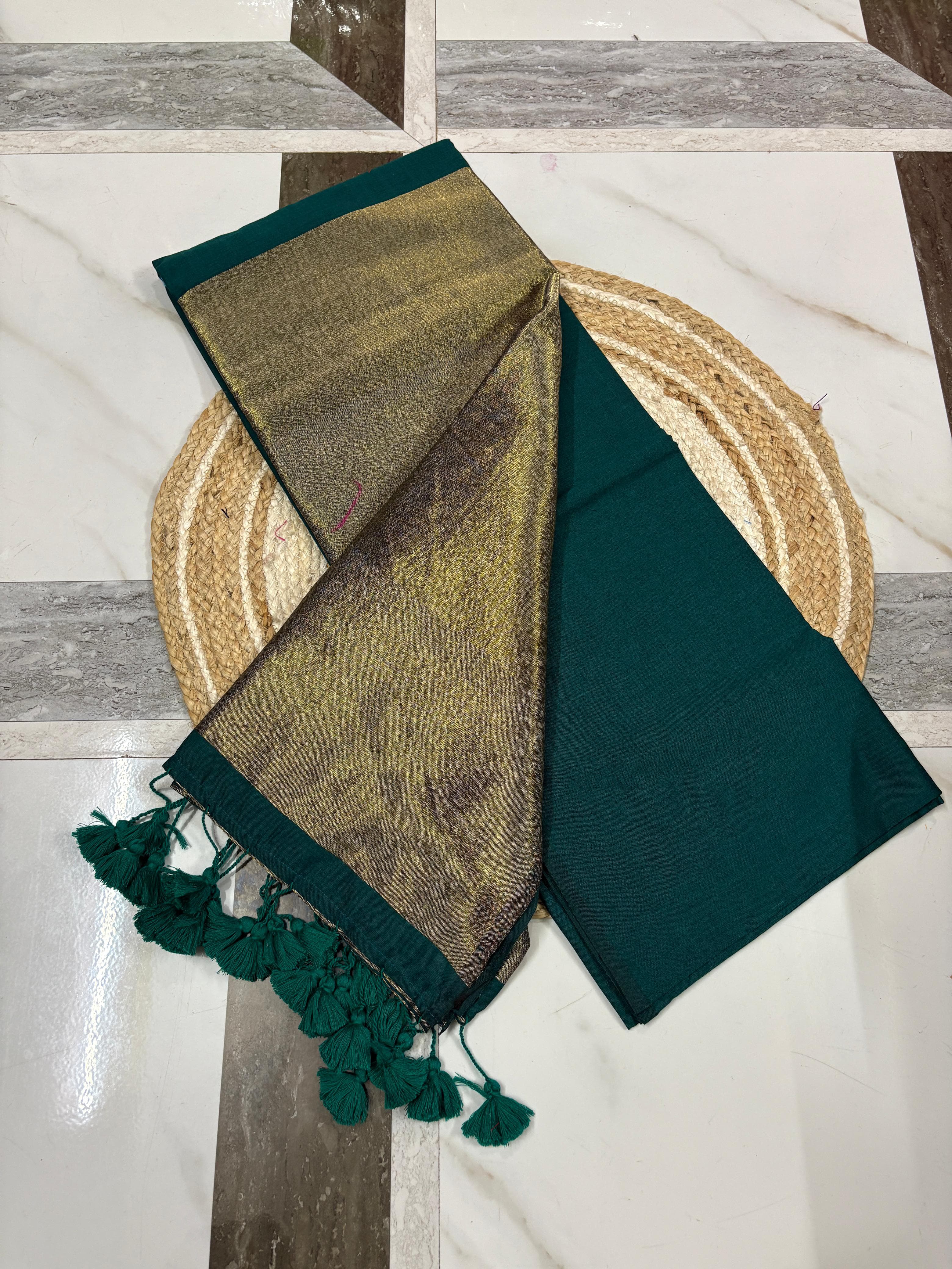 Elegant Dark Green Saree with Golden Border and Tassels - image 1