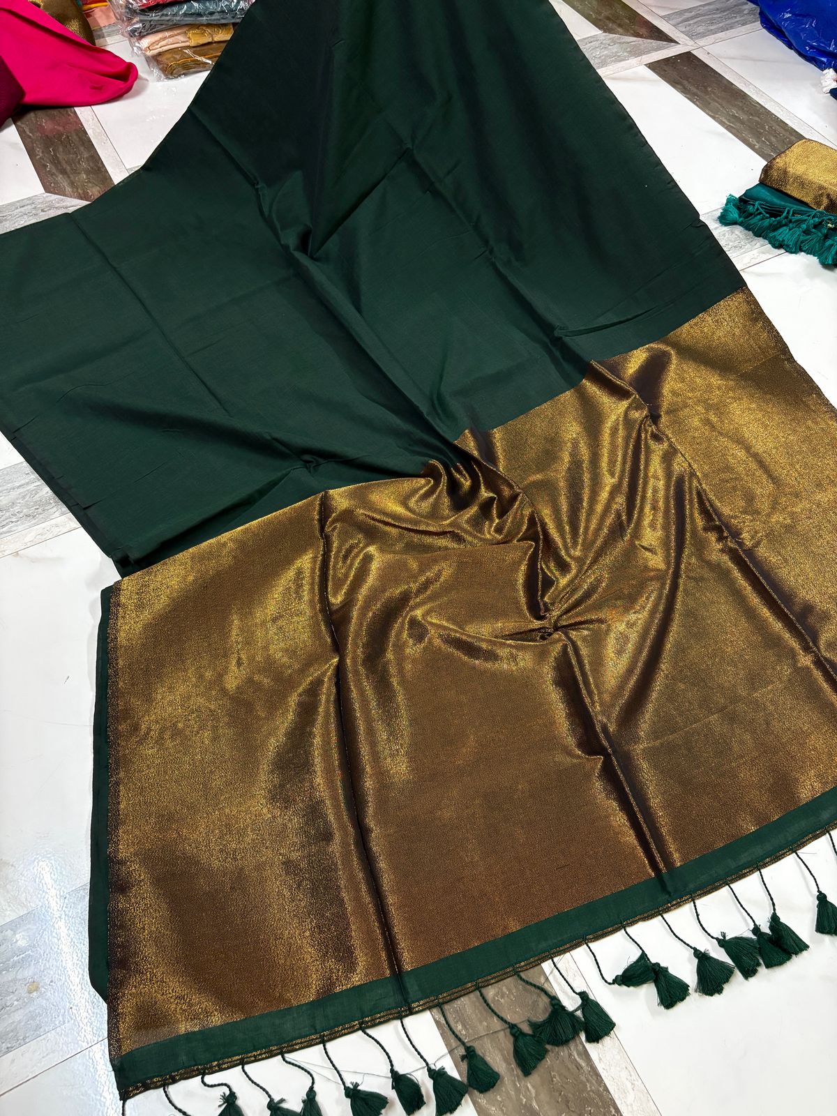 Elegant Dark Green Saree with Golden Border and Tassels